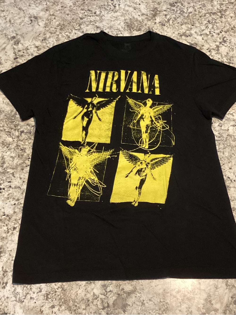 NIRVANA Black Short-Sleeve Tee with Yellow Angel Grid Graphic